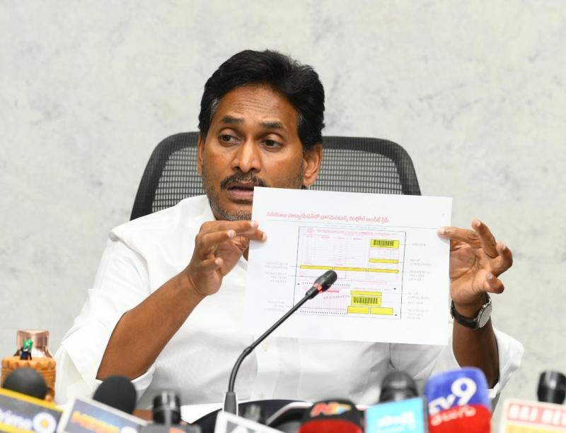 YS Jagan Mohan Reddy presenting a document during his 20 August 2026 press meet